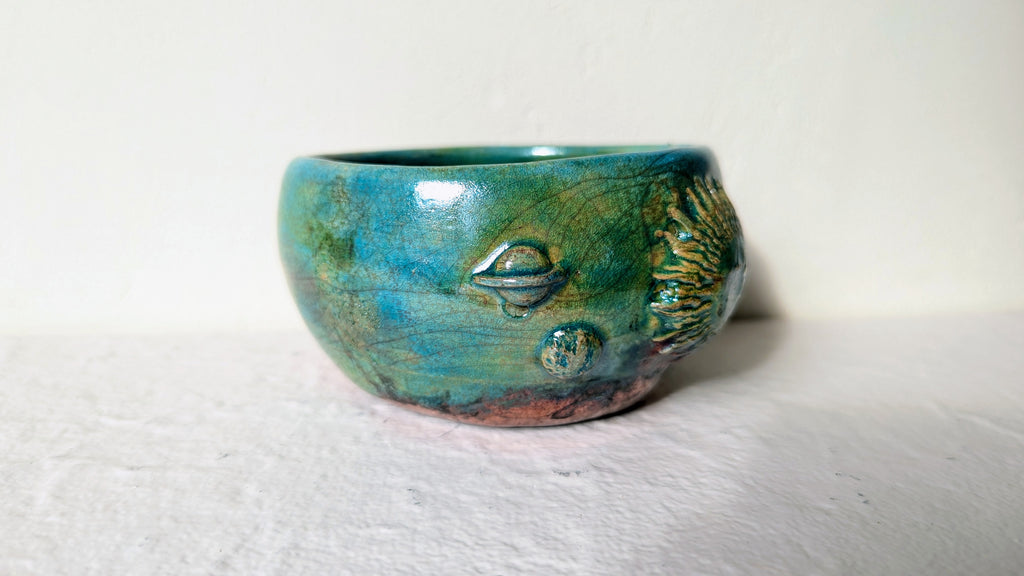 Vide poches Planets RAKU