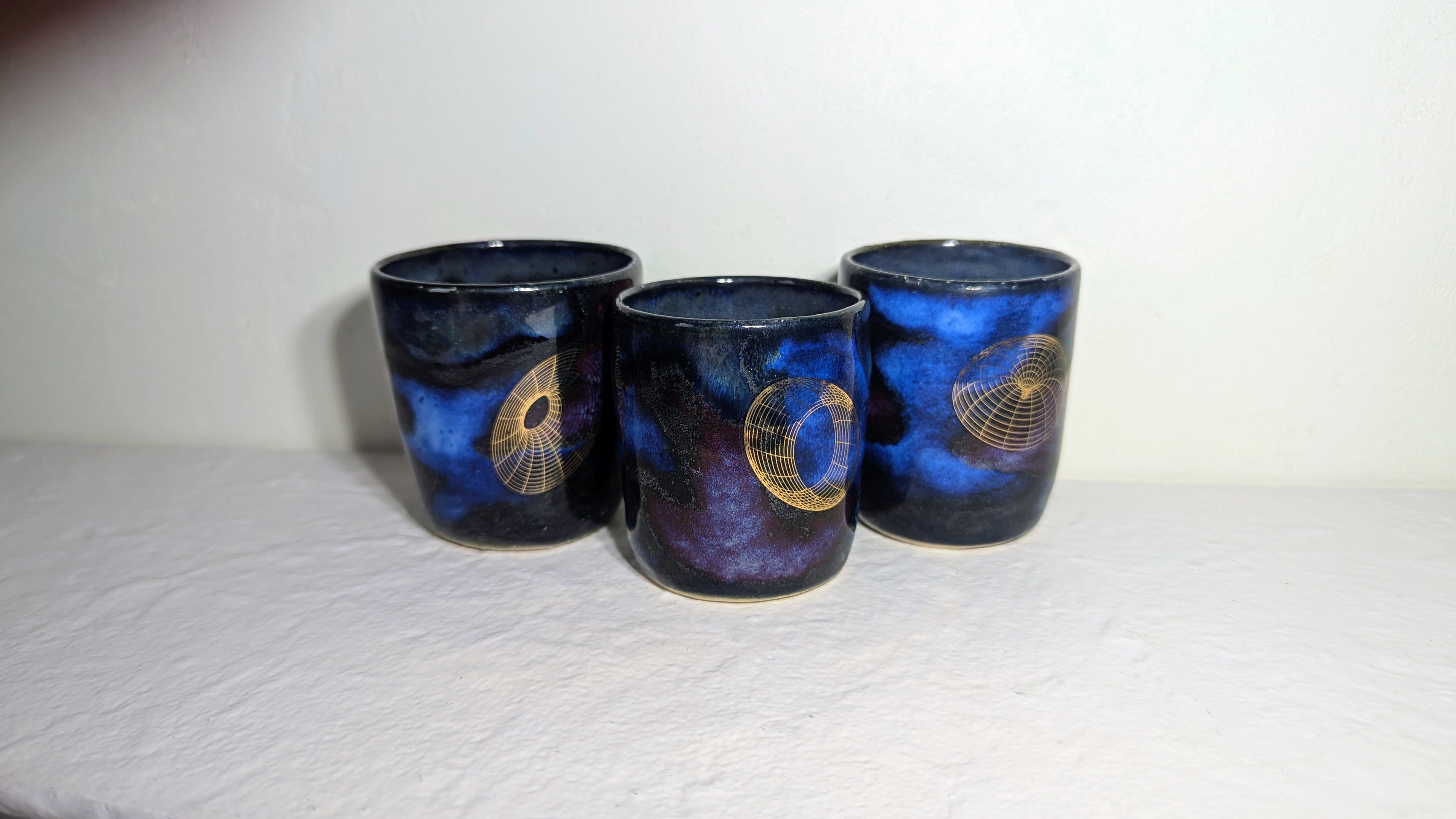 Set de trois tasses Espresso Universe plaquées or