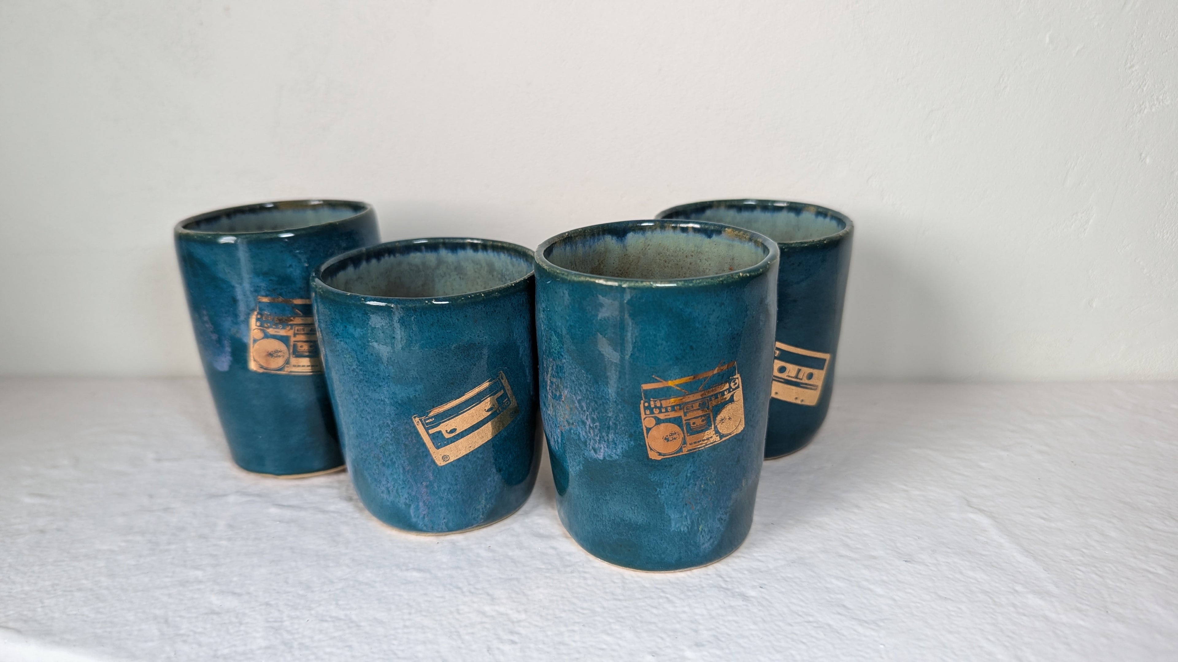 Set de quatre tasses Musique plaqué or véritable