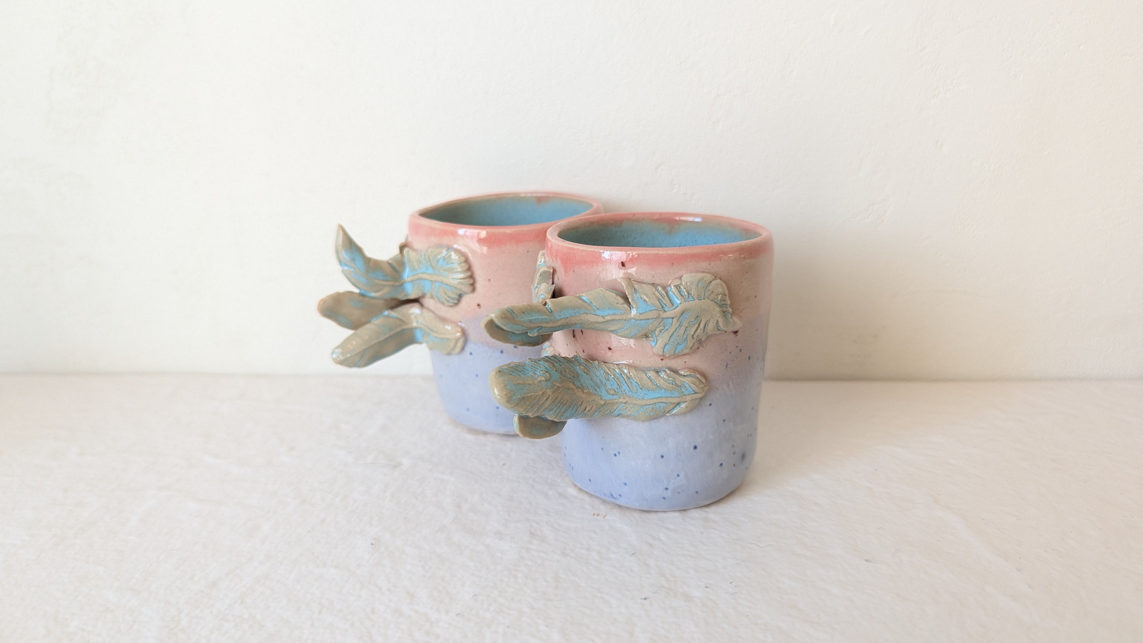 Set 2 tasses Anses à plumes