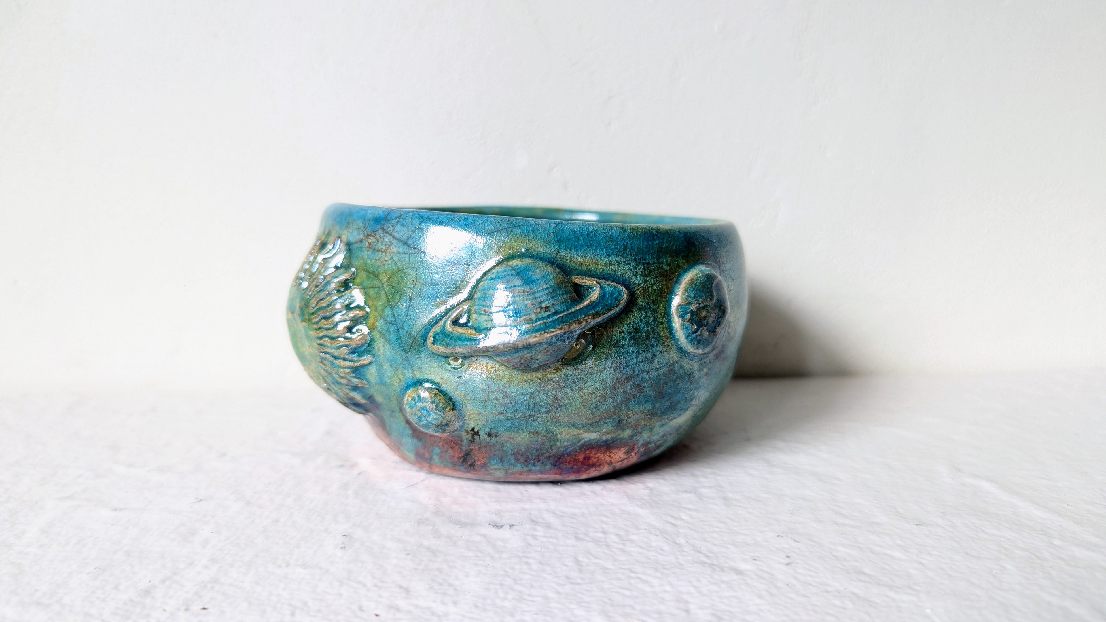 Vide poches Planets RAKU