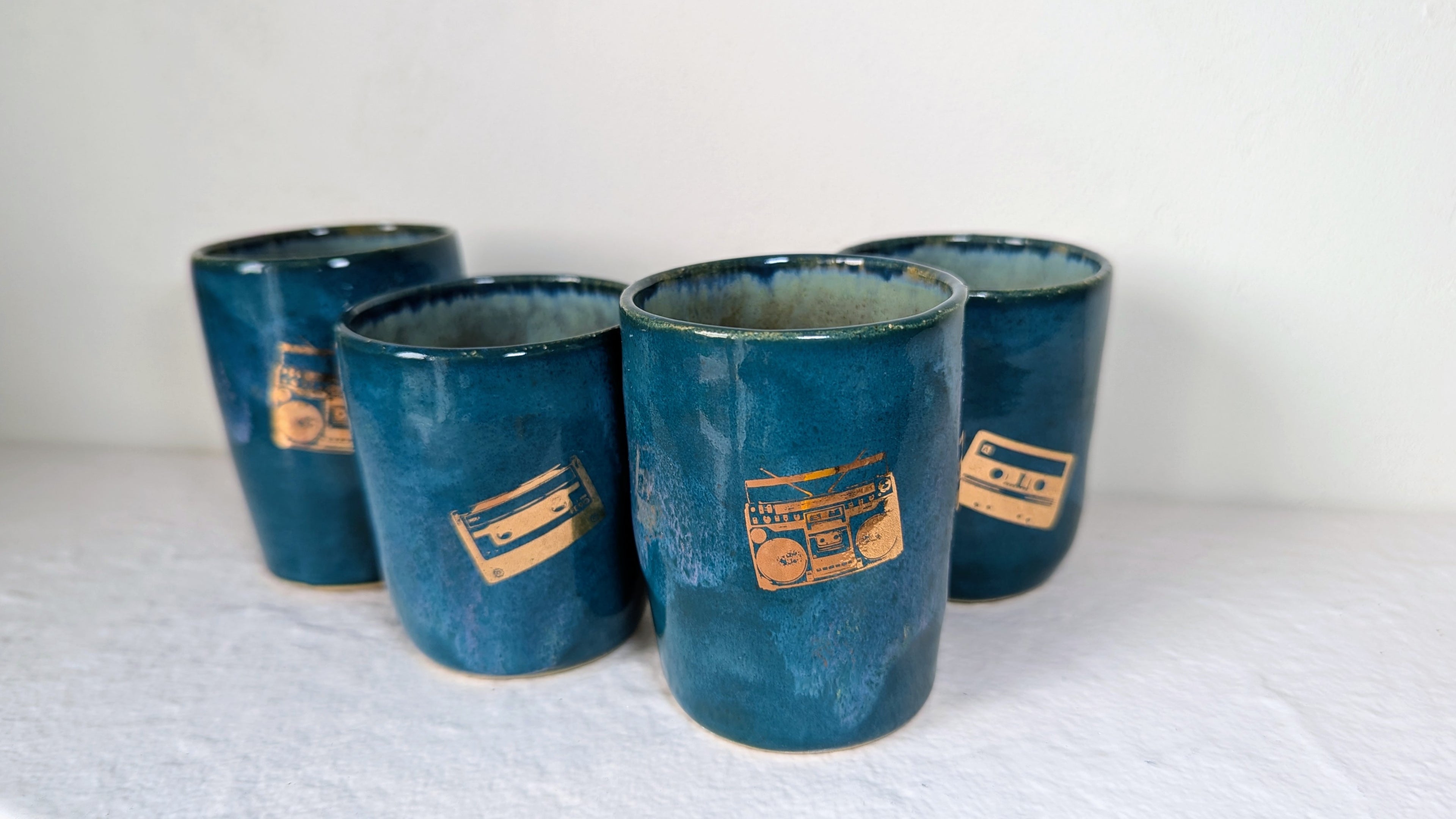 Set de quatre tasses Musique plaqué or véritable