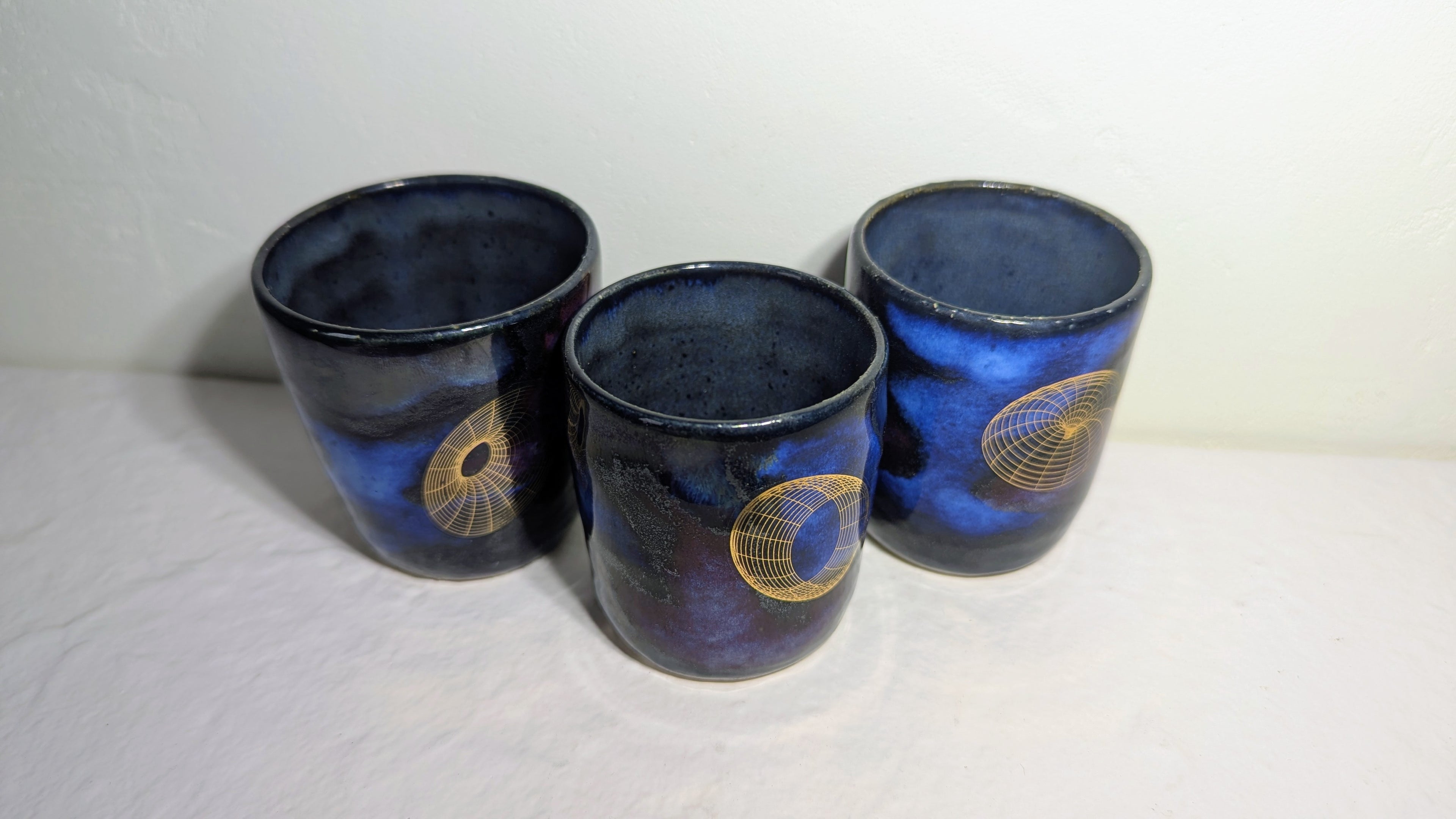 Set de trois tasses Espresso Universe plaquées or