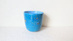 Petit pot en faience avec dorures