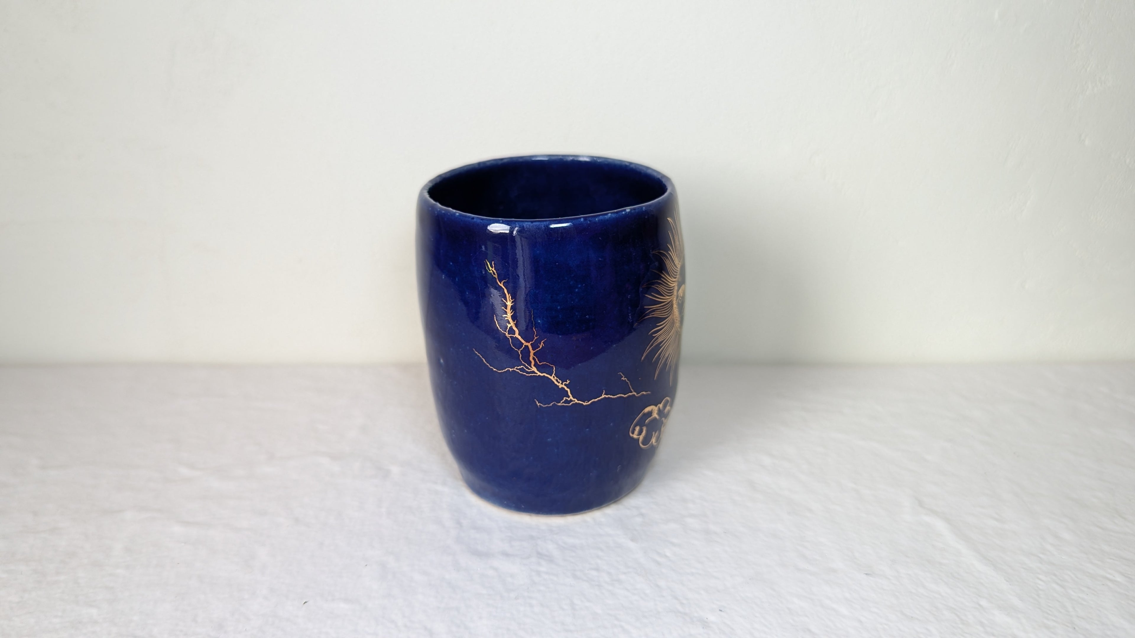 Tasse soleil 2 plaqué or véritable