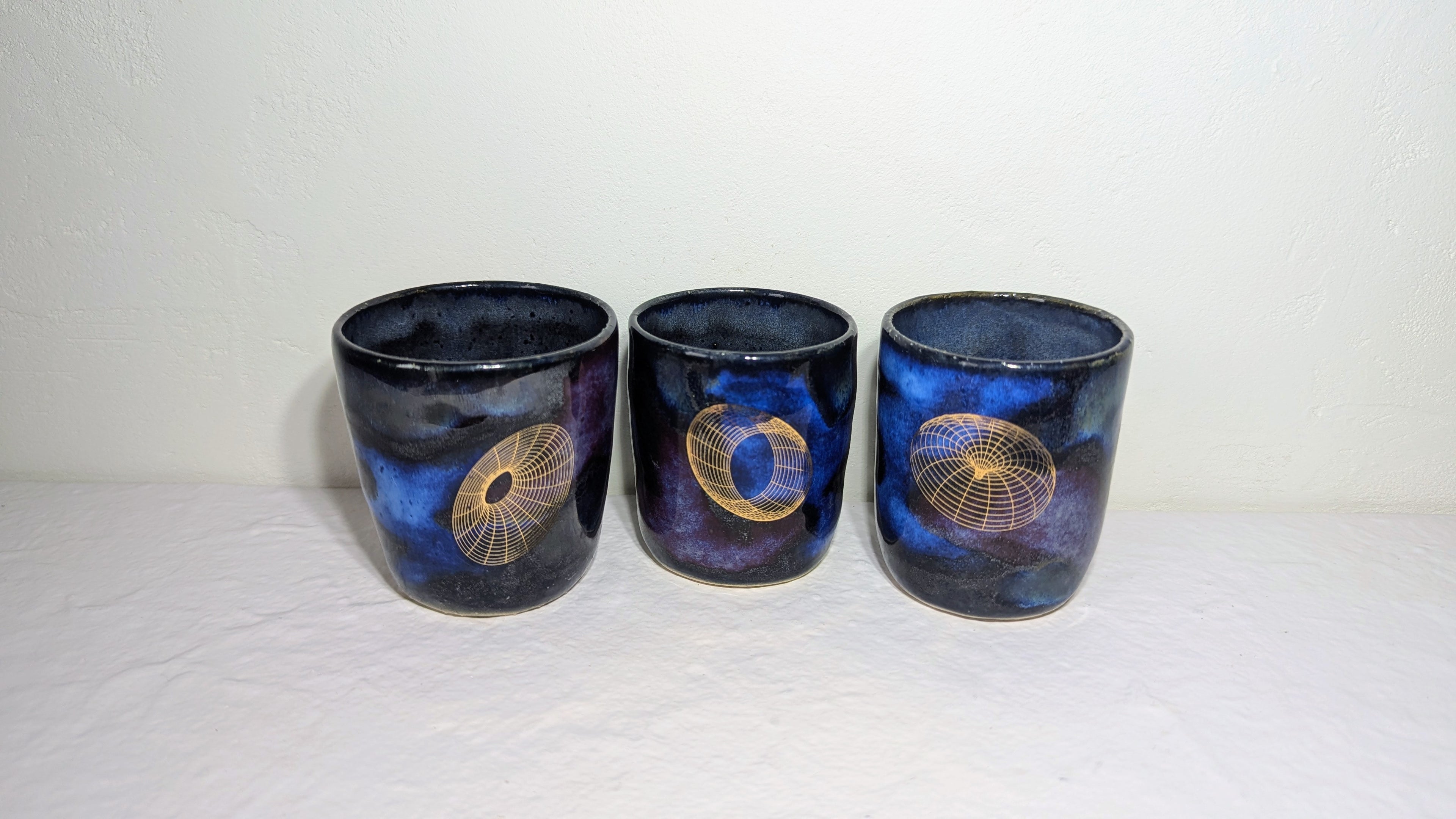 Set de trois tasses Espresso Universe plaquées or