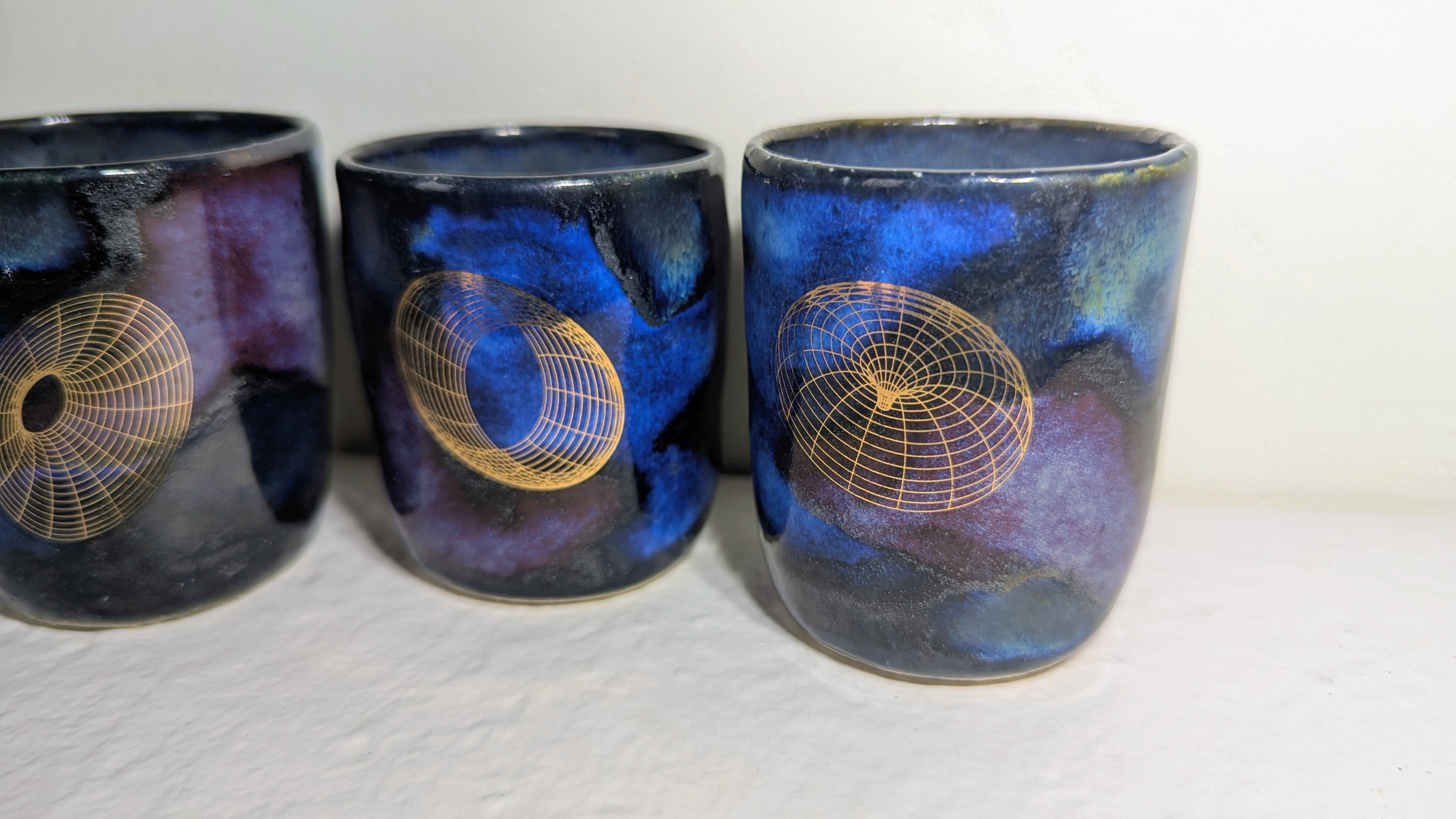 Set de trois tasses Espresso Universe plaquées or