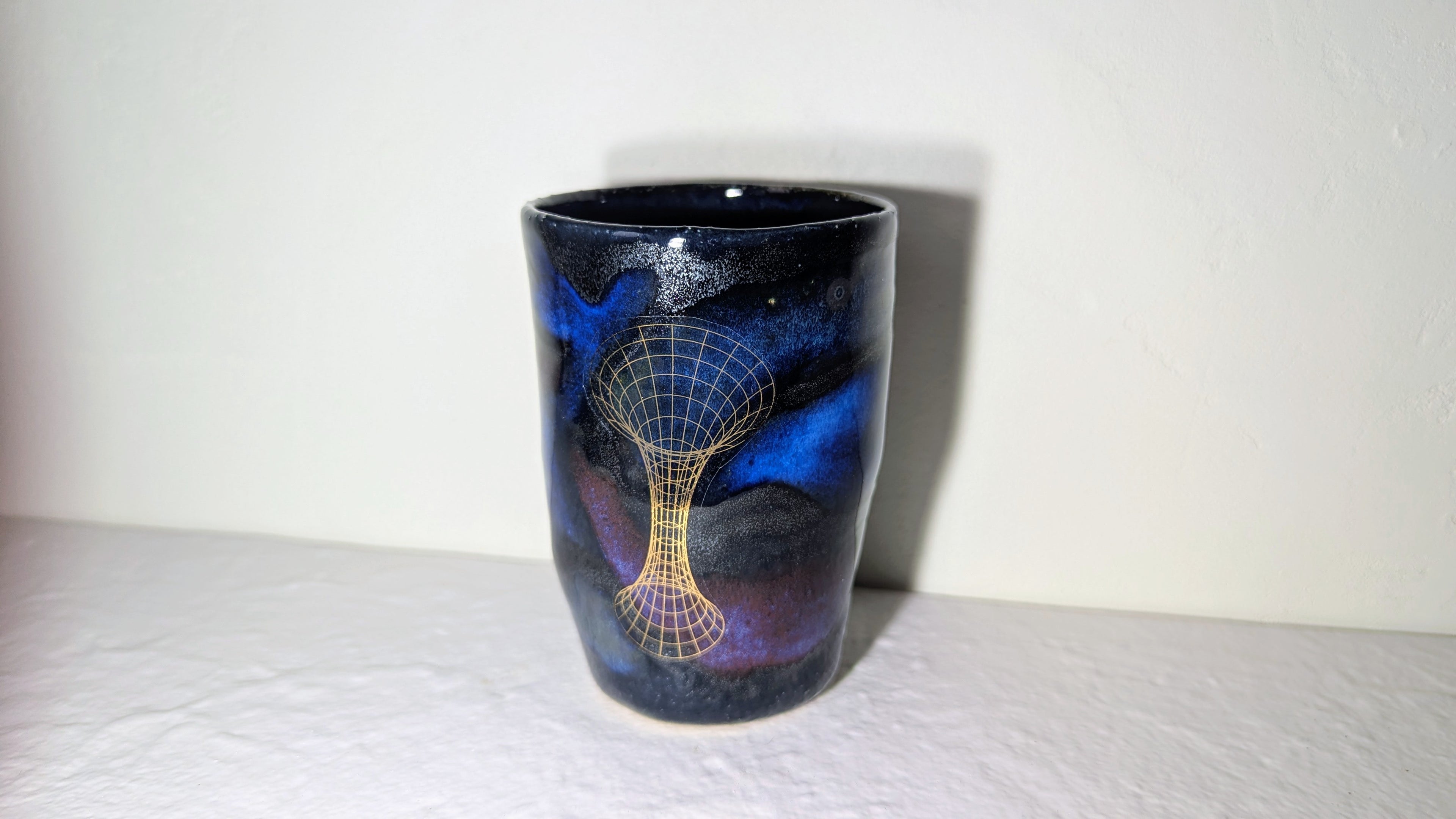 Grande tasse Univers plaqué or